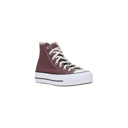 Converse purple fabric sneaker with lifted sole, ideal for casual style and comfort, featuring iconic design and women’s fit.