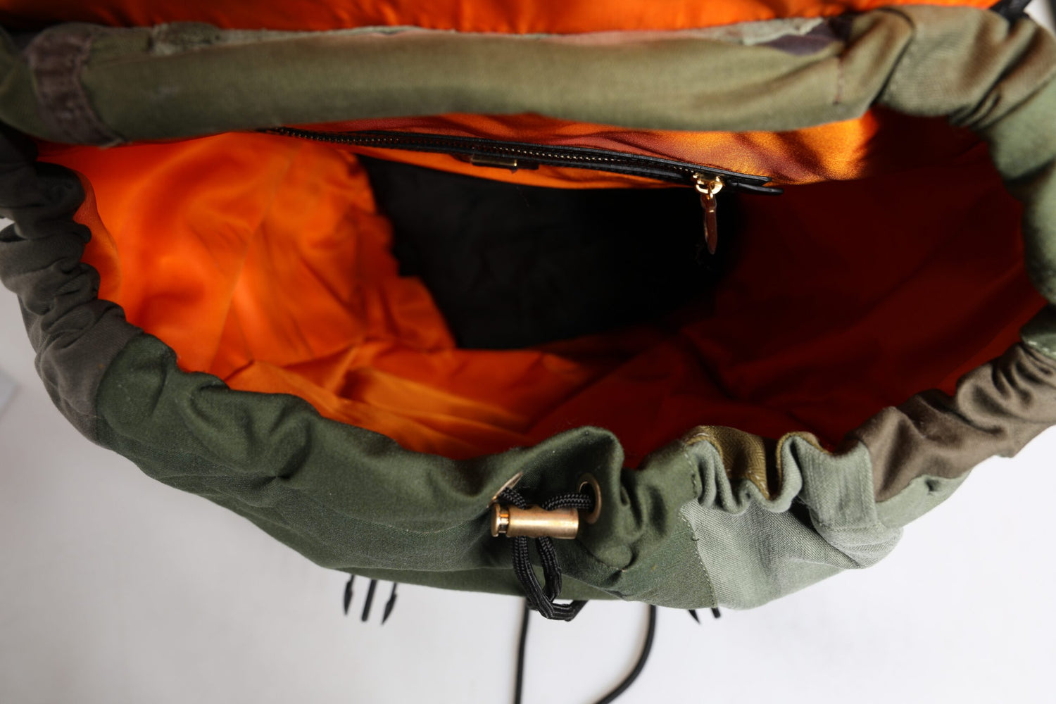 Front view with bag zipped and handles upright.