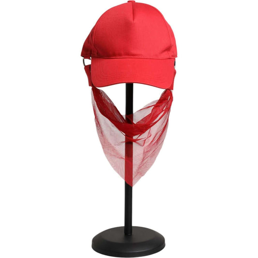 Dolce & Gabbana red cotton baseball cap with silk lining and logo, displayed on stand, women's fashion accessory, made in Italy.