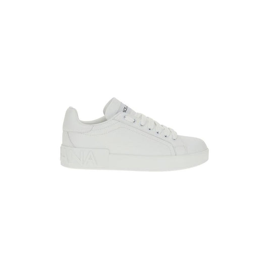 White Dolce & Gabbana leather sneakers with lace-up front, round toe, and flat sole featuring the iconic monogram design.