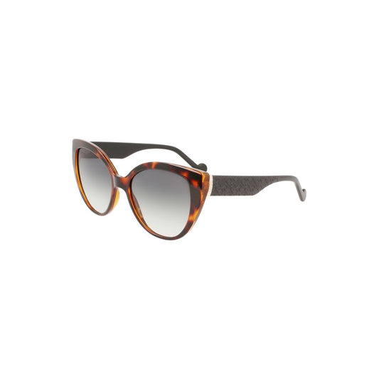 Brown cat-eye sunglasses with gradient lenses and textured temples, offering a stylish and chic accessory for women.