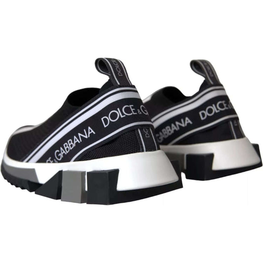 Dolce & Gabbana Sorrento Sneakers in black and white with logo print and pull strap, featuring a black decorative rubber sole.