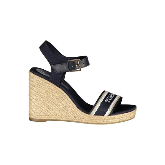 Tommy Hilfiger blue polyester sandal with 11 cm wedge, ankle buckle strap, contrast details, and logo embroidery on the strap.