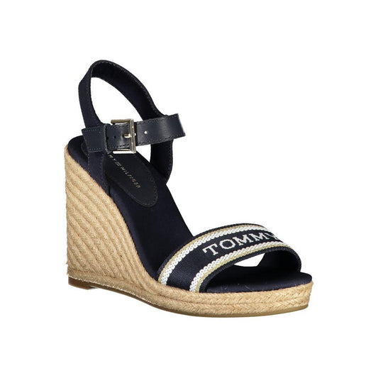 Tommy Hilfiger blue polyester sandal with 11 cm wedge, ankle buckle strap, contrast details, embroidery, and logo on toe strap.