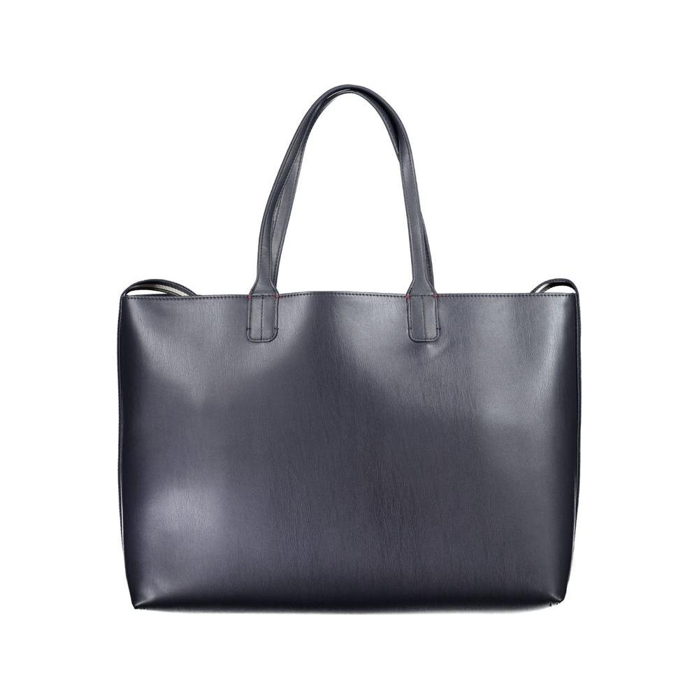 Front view with bag zipped and handles upright.