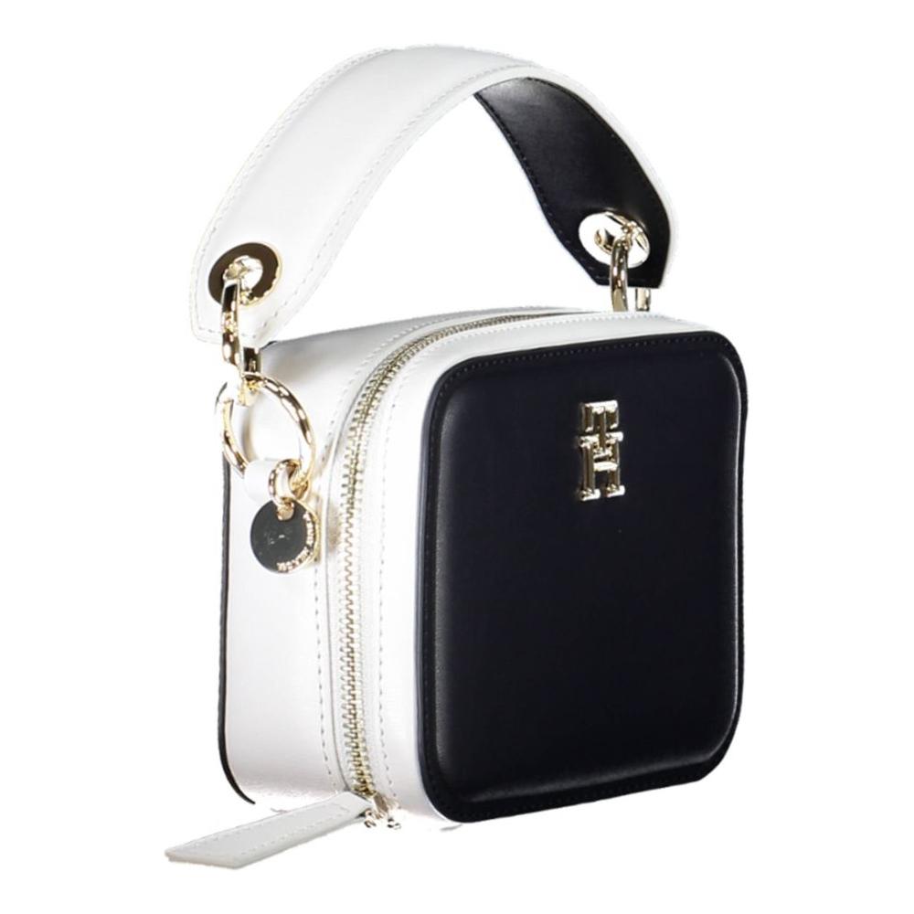 Front view with bag zipped and handles upright.