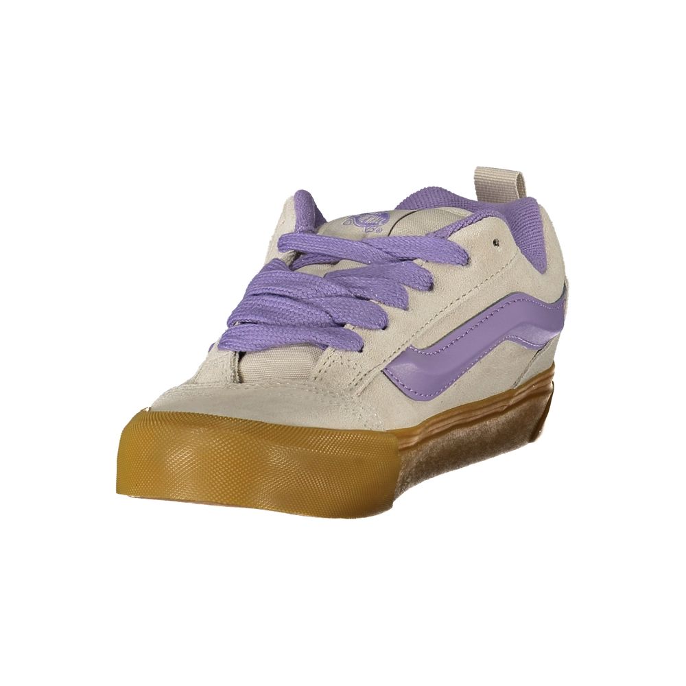 Vans Gray Leather Women Sneaker with Wisteria accents and iconic Vans logo, showcasing comfort and style in a lace-up design.