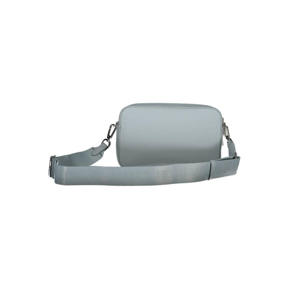 Front view with bag zipped and handles upright.