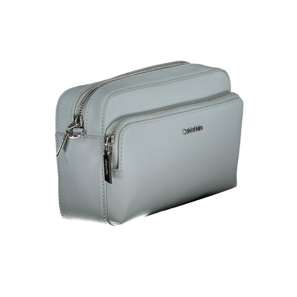 Front view with bag zipped and handles upright.