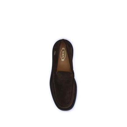 Top view of Tod's Brown Rubber Slip-On Loafers showcasing craftsmanship and elegance.