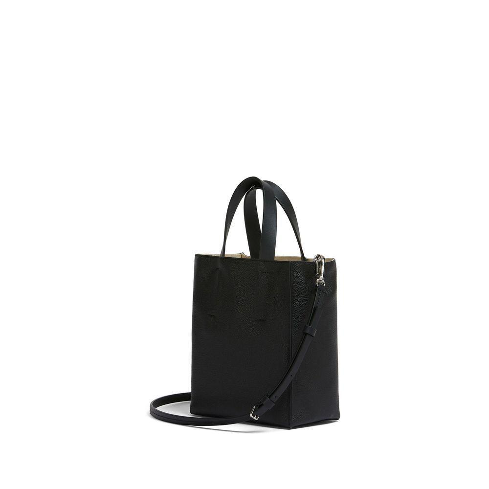 Front view with bag zipped and handles upright.