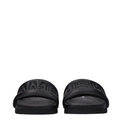 Ambush Black Leather Slippers with front logo, open toe design, leather material and rubber sole, MPN BMIC001LEA0011000.
