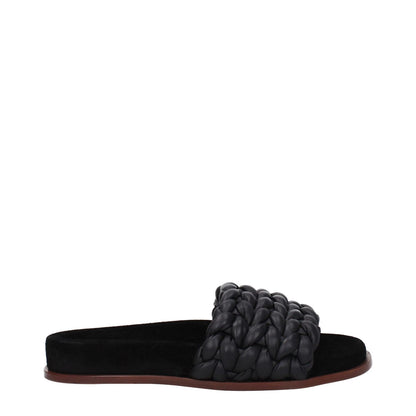 Chloé Black Leather Slippers with open toe design, low flat heel, and woven strap. Casual style, leather sole. MPN CHC22S557X6001.