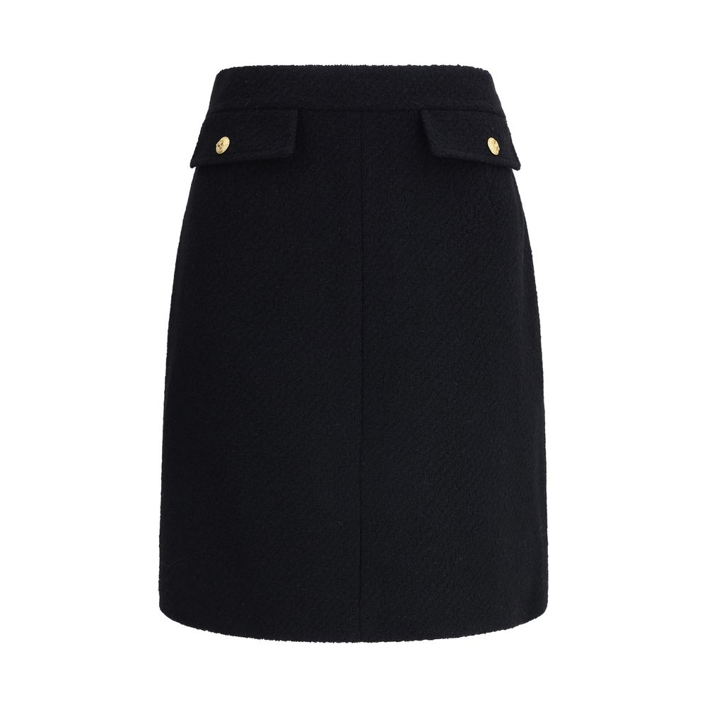 Chloé Black Wool Midi Skirt with front flap pockets and gold-tone buttons, designed for AW25 season.