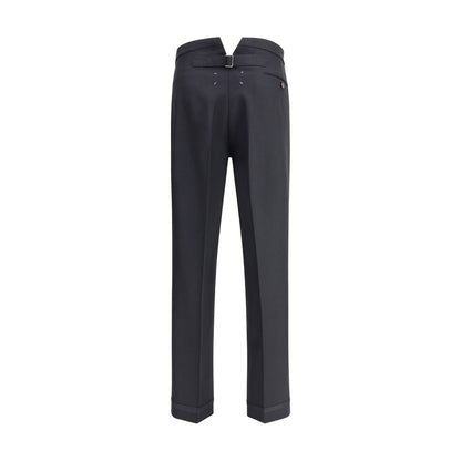 Margiela Black Wool Dress Pants with pleated design, logo closure, and white embroidered topstitching detail at back.