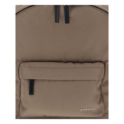 Givenchy Brown Polyamide Backpack with leather pull tabs and metal logo on front, featuring zippered pockets for organized storage.