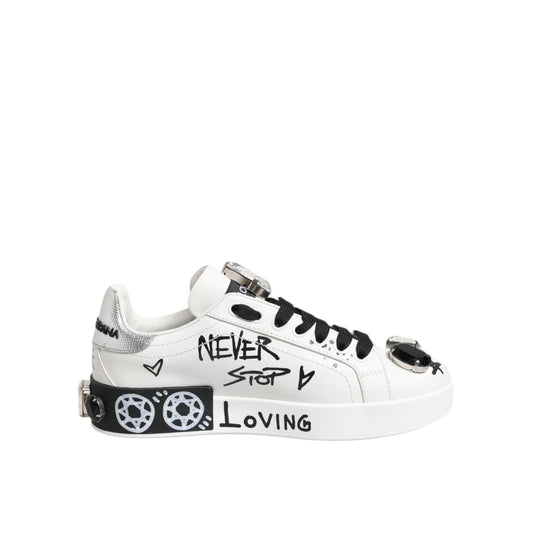 Dolce & Gabbana White Portofino Crystal Sneakers Shoes with graffiti print, clear crystals, and black rhinestones.