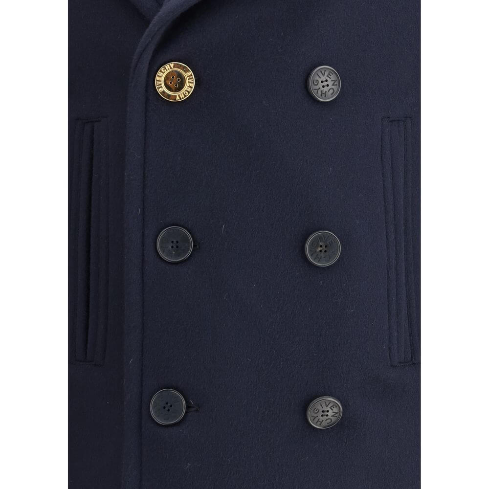 Givenchy Blue Wool Coat with double-breasted buttons and wide lapels, detailed view of front button closure and welt pockets.