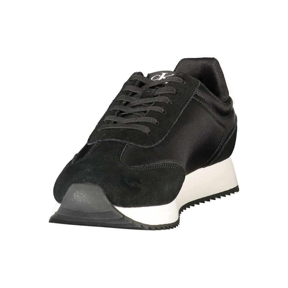 Calvin Klein Black Leather Men Sneaker with sleek design and white accents, featuring the iconic logo, perfect for fashion-forward individuals.