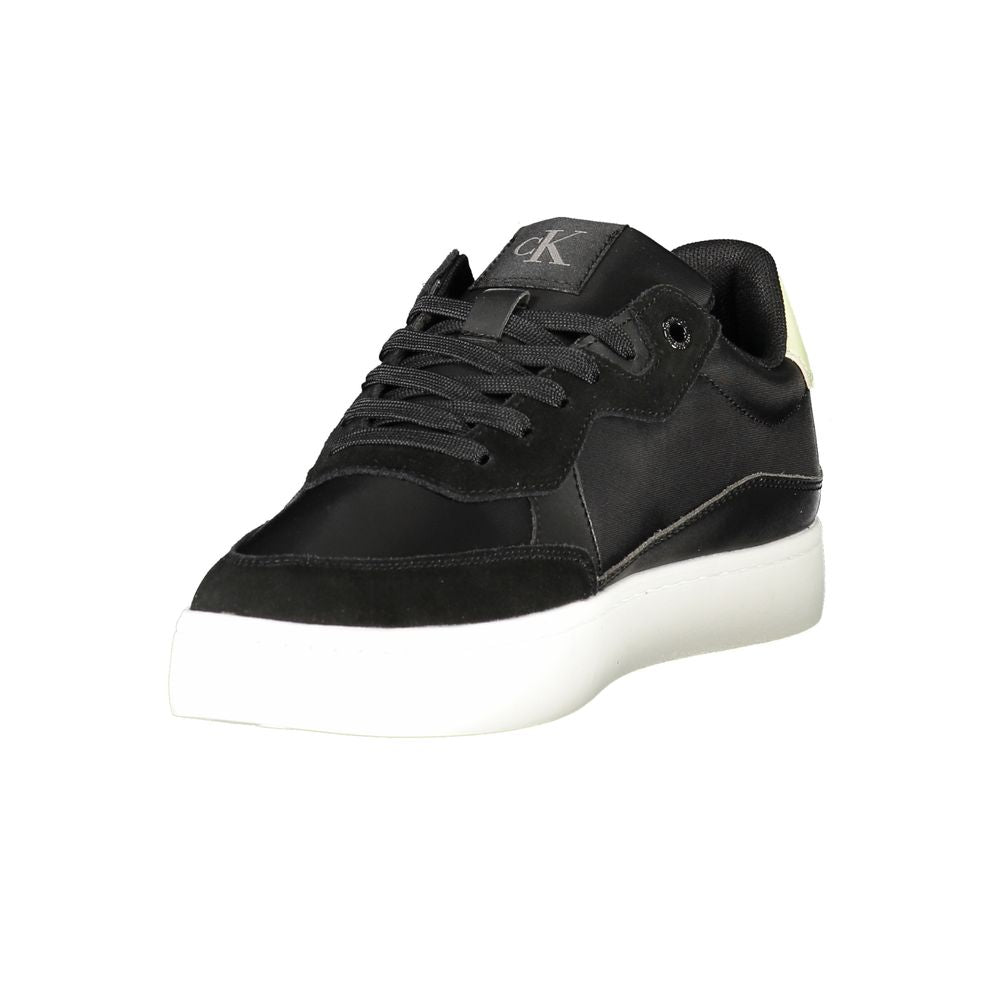 Calvin Klein Black Leather Men Sneaker with sleek design and iconic logo, featuring contrast details and removable footbed for comfort.