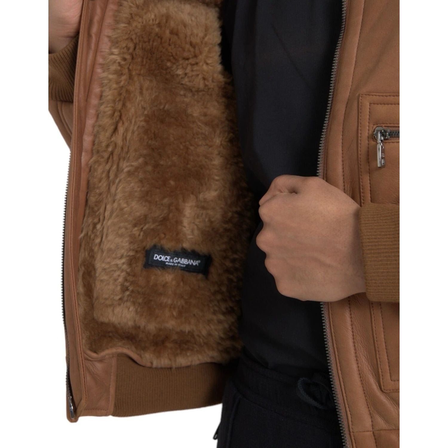 Front view with bag zipped and handles upright.