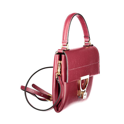 Coccinelle Purple Leather Women Handbag with adjustable strap and twist closure.