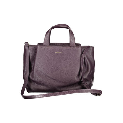 Coccinelle Purple Leather Women Handbag with twin handles and adjustable strap, showcasing sophisticated design and ample pockets.