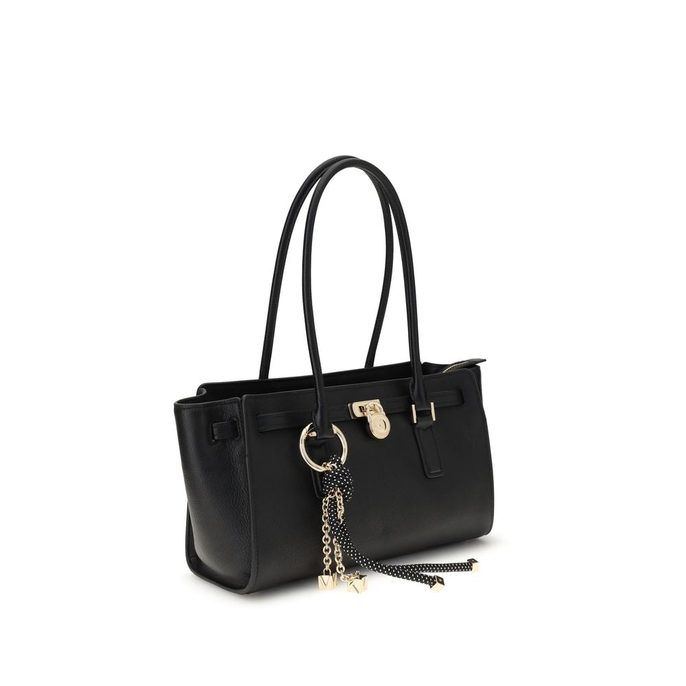 Front view with bag zipped and handles upright.