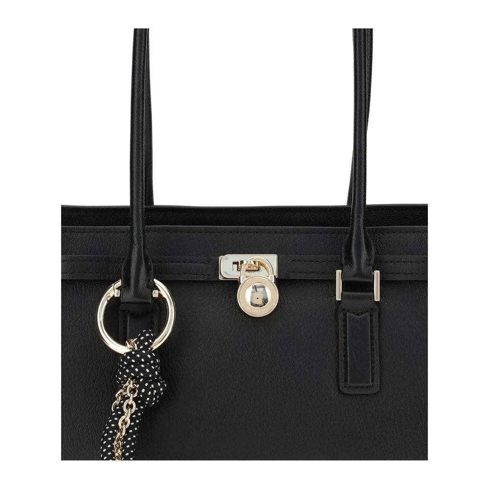 Front view with bag zipped and handles upright.