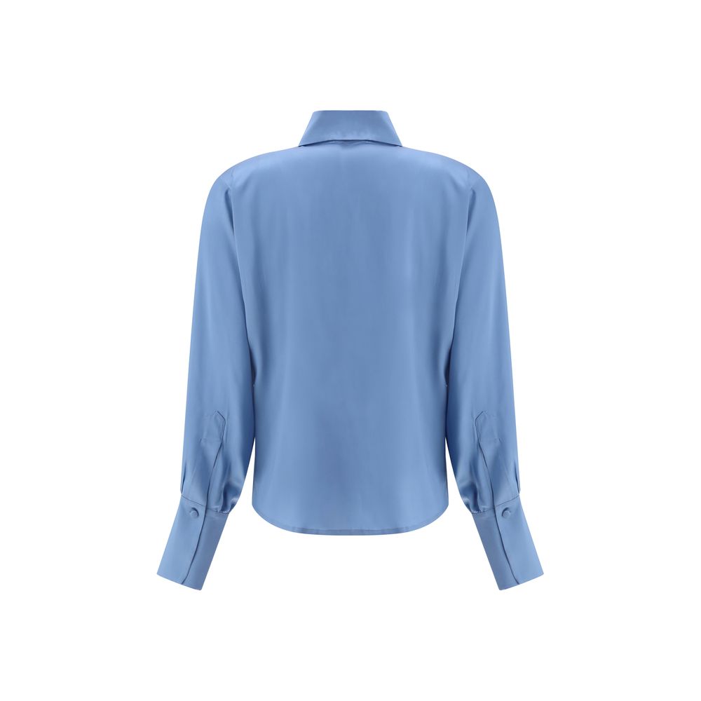 Back view of Crida Milano Light Blue Silk Shirt with smooth luminous texture, high collar, button cuffs, and minimalist elegance