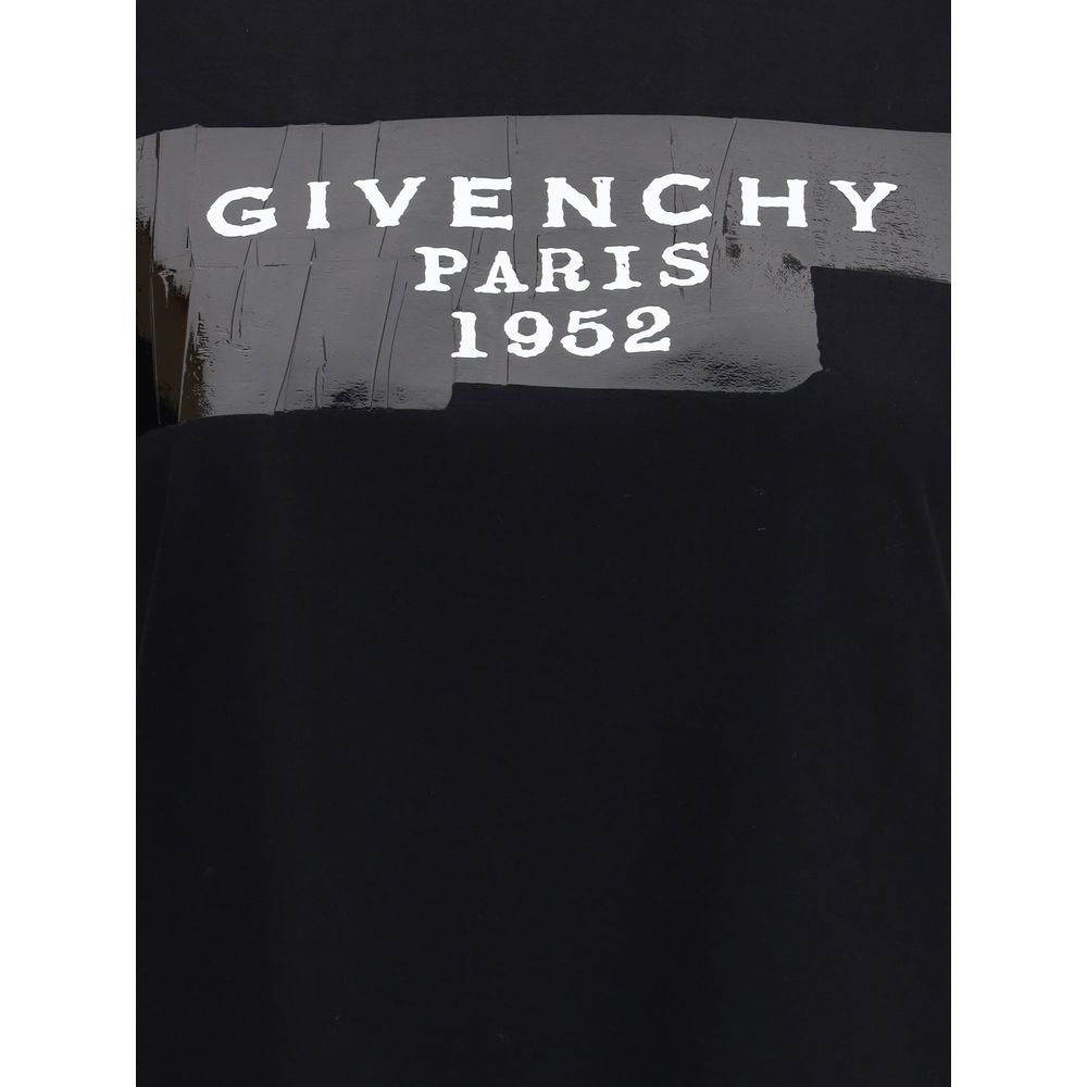Close-up of Givenchy Black Cotton T-Shirt with 'GIVENCHY PARIS 1952' print on front in black and white.