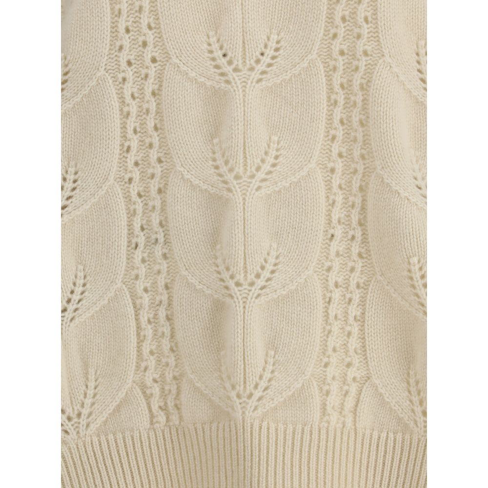 Close-up of Ermanno Scervino Cream Cashmere Sweatshirt showcasing perforated design and ribbed hem.