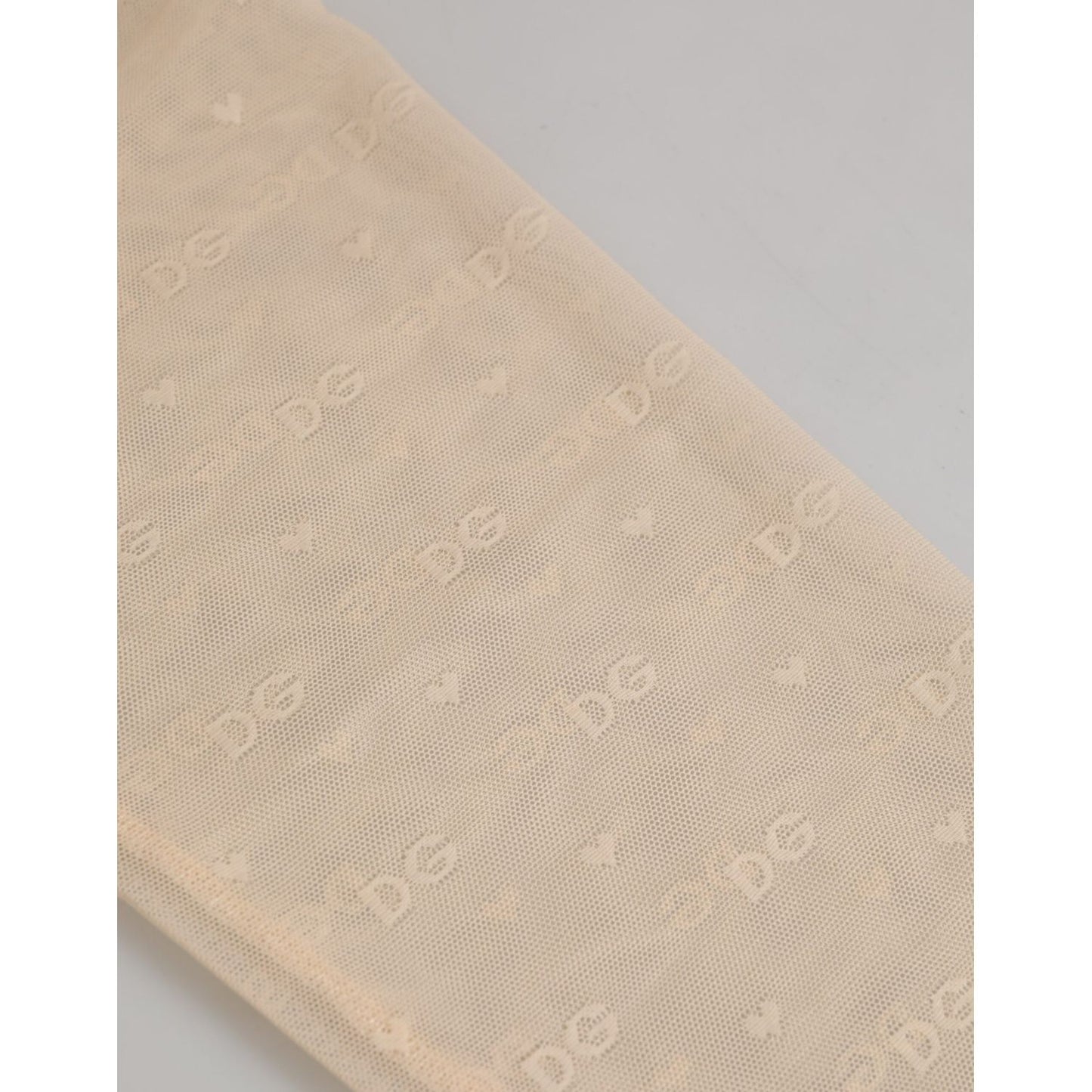 Dolce & Gabbana Beige Nylon Logo Lace Leggings Pants Underwear featuring intricate lace and logo waistband.