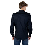 Back view of Antony Morato Blue Cotton Shirt on male model, highlighting slim fit and long sleeves for formal and casual style.