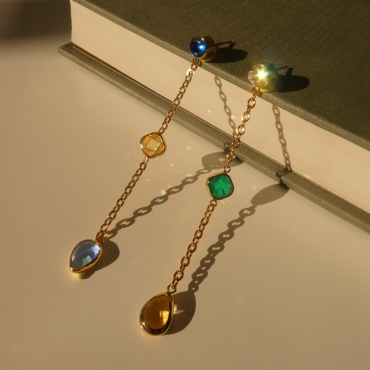 Elegant AN JEWELS JEWELRY Mod. AL.E2WI23SMC1 earrings with colorful gemstones and gold chain design.