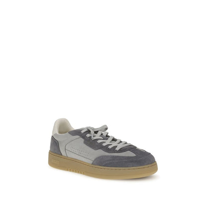 Axel Arigato Gray Leather Low Top Sneakers with suede accents and lace-up design, inspired by 1970s running shoes and 1990s skate style.