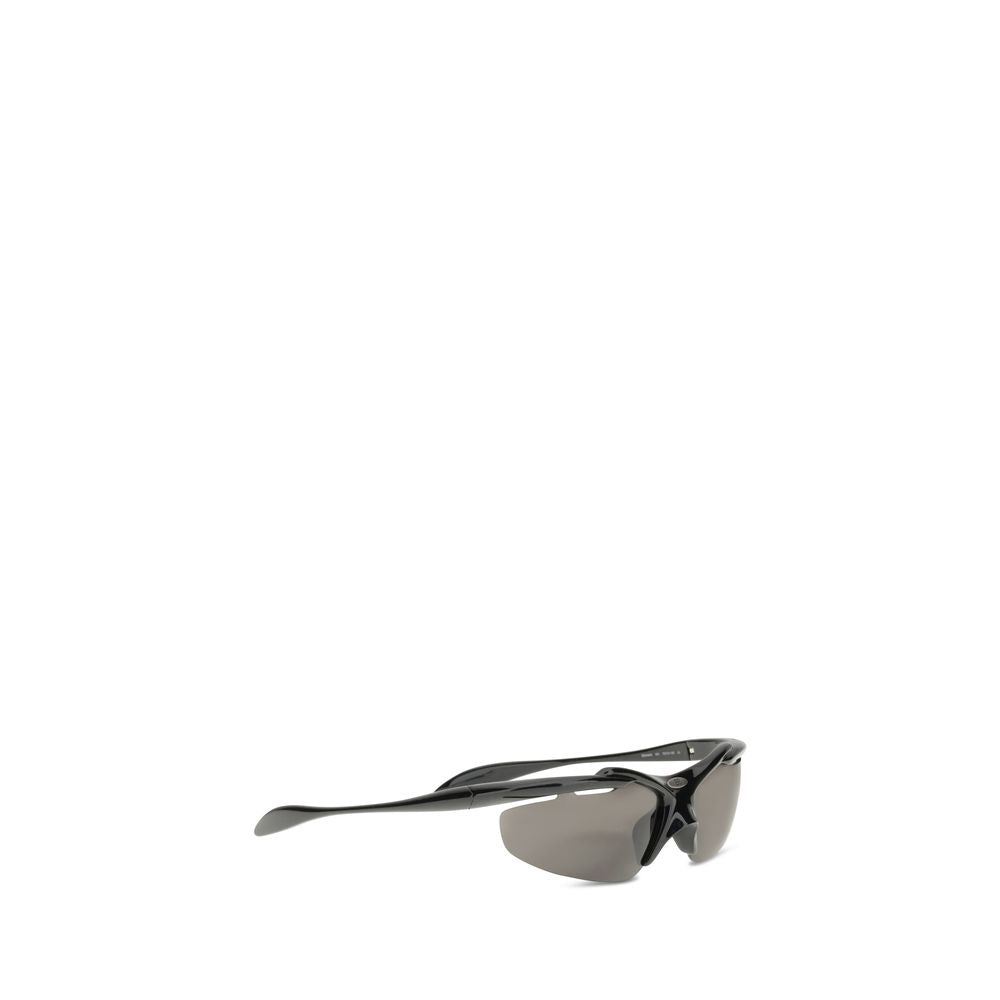 Balenciaga Turbo D-frame sunglasses featuring sporty D-frame design with flexible temples and central BB logo plaque.