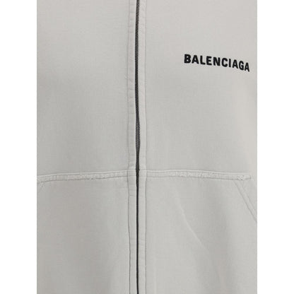 Balenciaga White Cotton Sweatshirt with worn effect and logo, featuring practical patch pockets and detailed hem and cuffs.