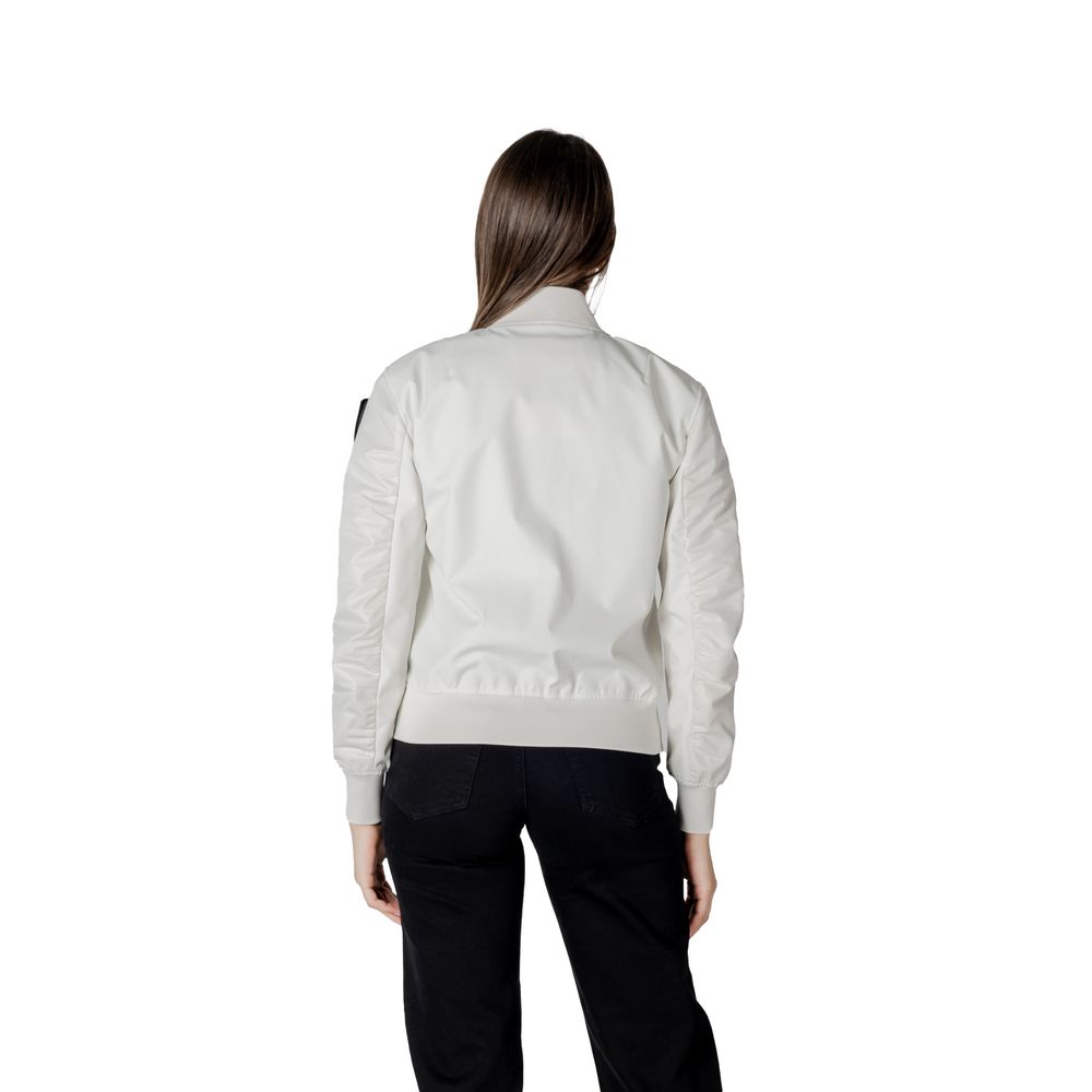Back view of woman wearing Blauer White Polyamide Bomber with elastic cuffs and front zipper in urban style.
