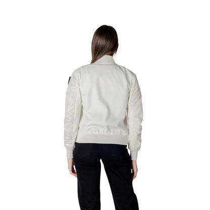 Back view of woman wearing Blauer White Polyamide Bomber with elastic cuffs and front zipper in urban style.