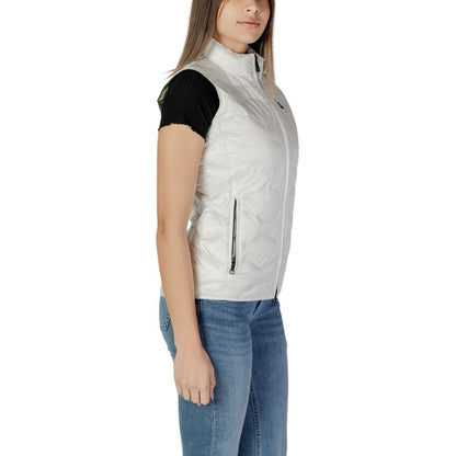 Woman wearing Blauer White Polyamide Sleveless Jacket with wavy quilting and side zip pockets, perfect for transitional seasons.