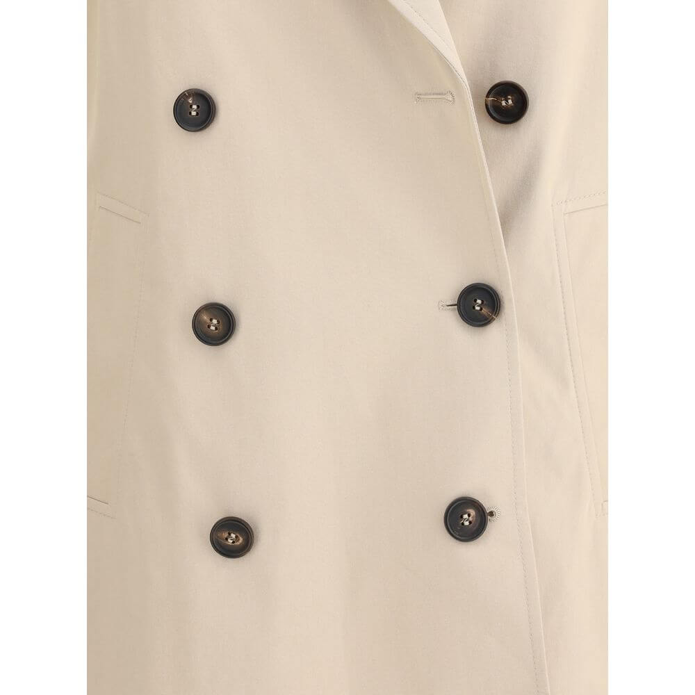 Close-up of Brunello Cucinelli Beige Cotton Coat featuring double-breasted buttons and elegant design for a sophisticated look.