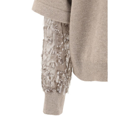 Close-up of Brunello Cucinelli Brown Calf Leather Bos Taurus Turtleneck with unique sleeve design and ribbed cuffs