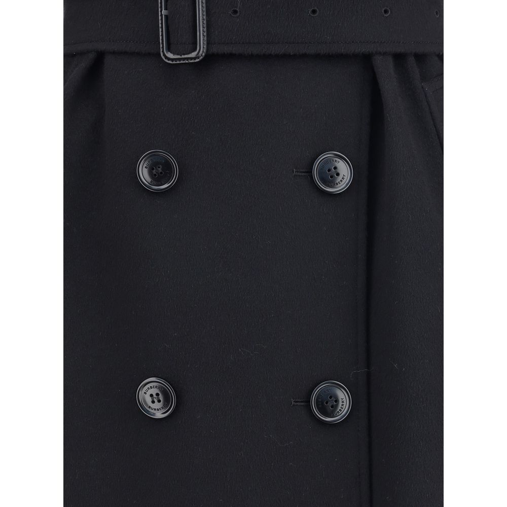 Close-up of Burberry Black Cashmere Coat showing double-breasted button closure and waist belt detailing.