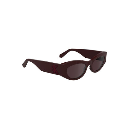 Calvin Klein Red Acetate Women Sunglasses with cat eye design and brown lenses in an eco-friendly bio-acetate frame, chic and stylish.