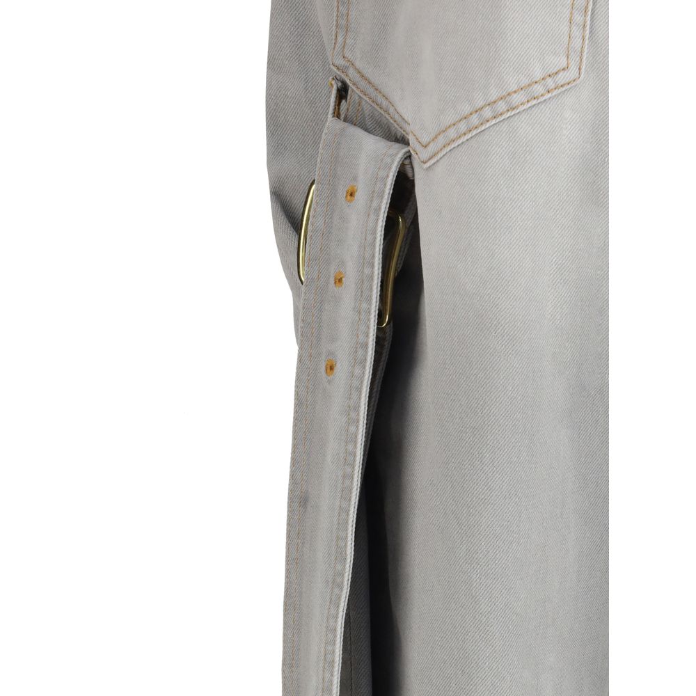 Close-up of Darkpark Gray Cotton Relaxed Fit Jeans with frayed hem and gold hardware detailing.