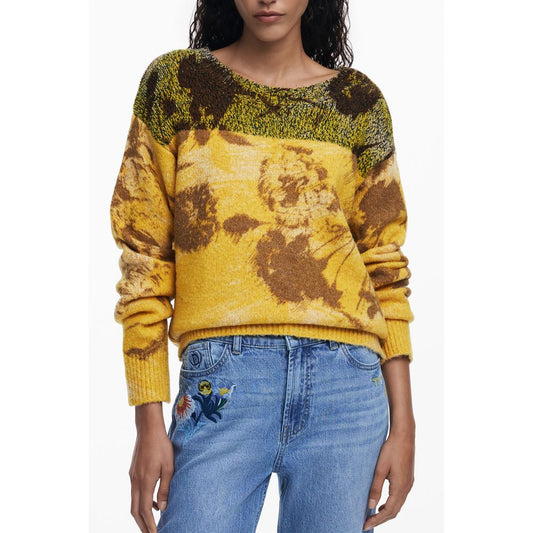 Desigual Yellow Wool Women Sweater with floral pattern and crew neck, styled with blue jeans. Perfect blend of warmth and fashion-forward design.