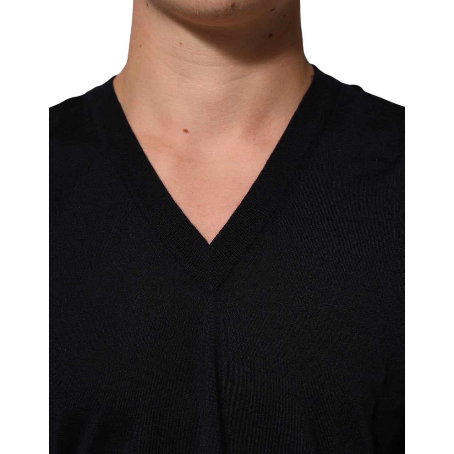 Dolce & Gabbana Black Cashmere Knit V-Neck Pullover Sweater with ribbed trims and classic pullover silhouette, perfect for layering.