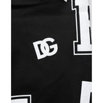Dolce & Gabbana Black Logo Print Cotton Casual Bermuda Short showing white 'DG' logo detail on black cotton fabric.