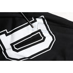 Close-up of Dolce & Gabbana Black Logo Print Cotton Casual Bermuda Short with drawstring and white logo detail.